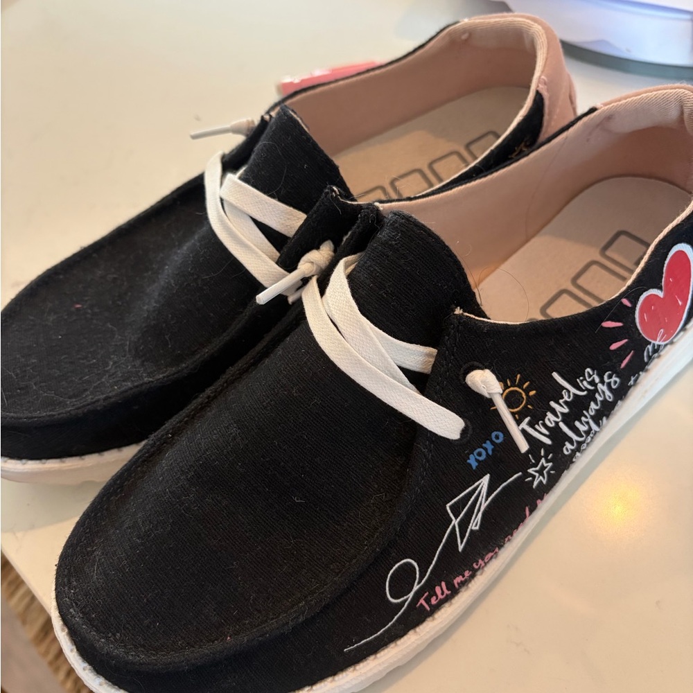 Hey Dudes- Black Canvas Casual Slip-On Shoes with White Laces and travel- size 9
